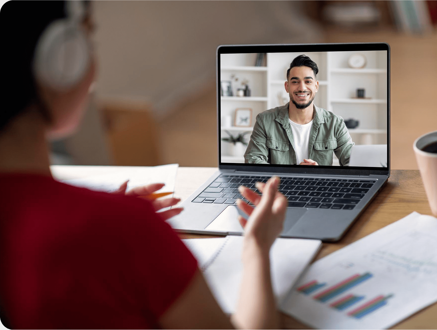 woman engaging in video call with a man on laptop