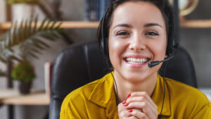 woman smiling wearing headset