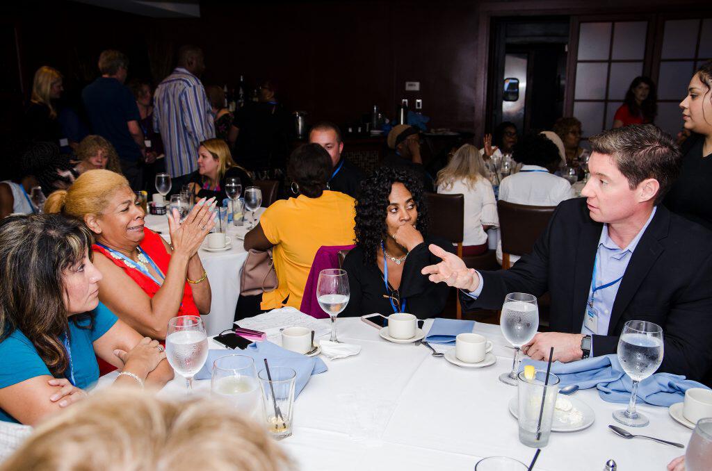 Liveops CEO and winner of multiple Stevie Awards, Greg Hanover leads agents in discussion at Chicago luncheon in 2018