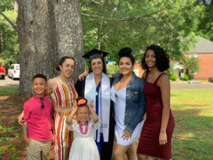 Liveops Teresita Johnson celebrates graduation with her family
